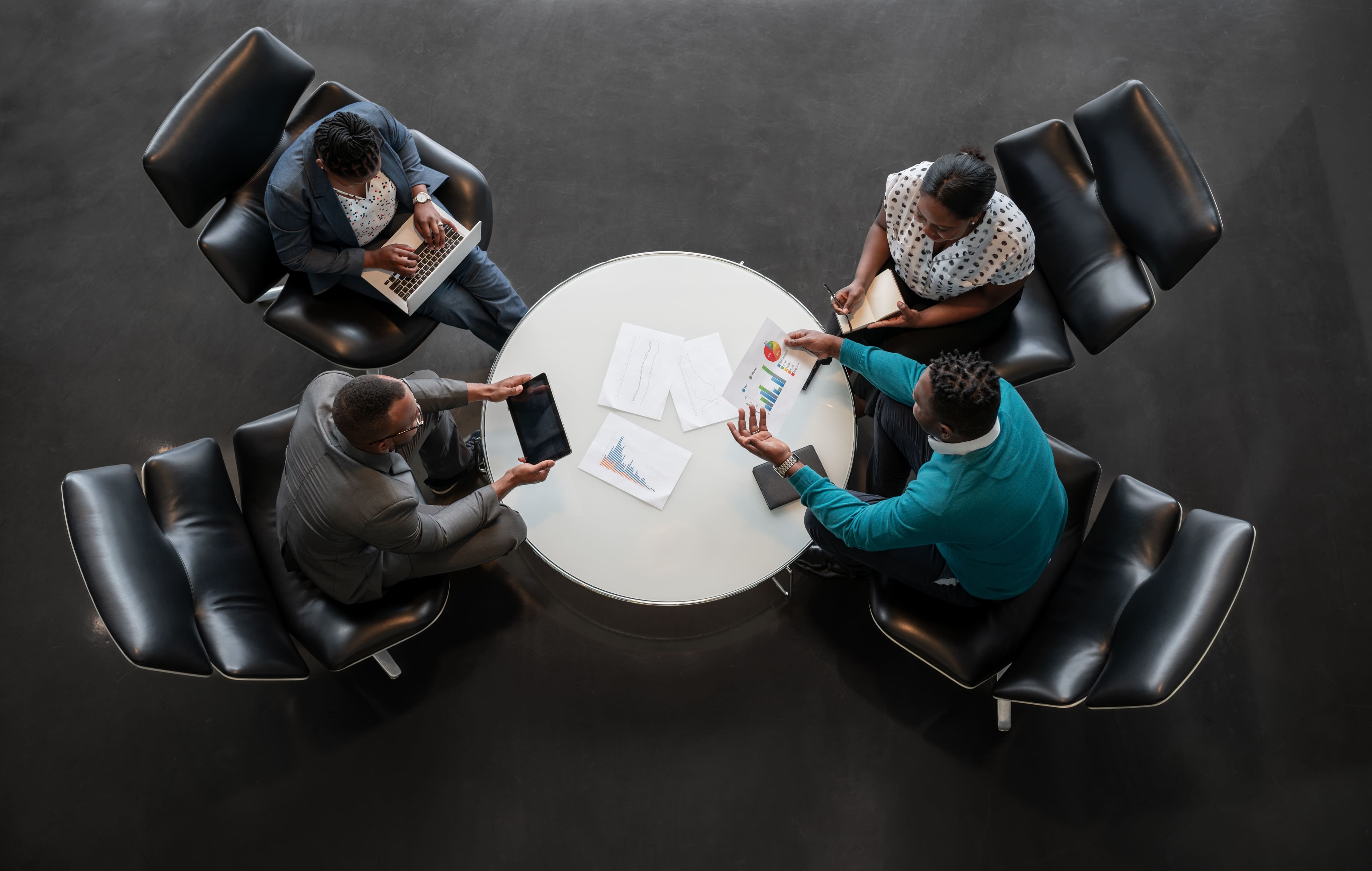 Team collaborating at a round table